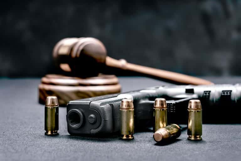gavel and bullets with pistol