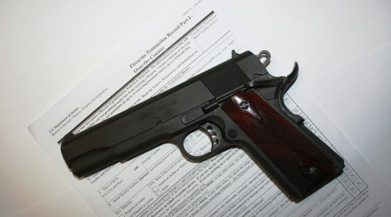 Background Checks pistol with ATF Form 4473