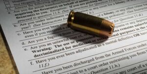 NICS Background check form with Bullet